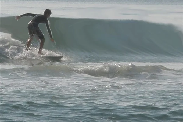 Surfing big wave