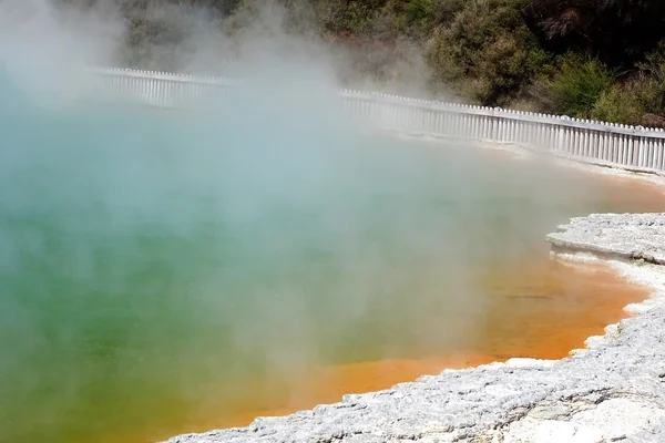 Rotorua. The sulphur coloured edge of Champagne Lake in the geothermal volcanic park of Wai O Tapu.