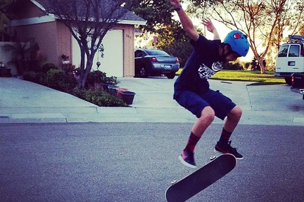 Jeremy is also practicing his skateboard tricks