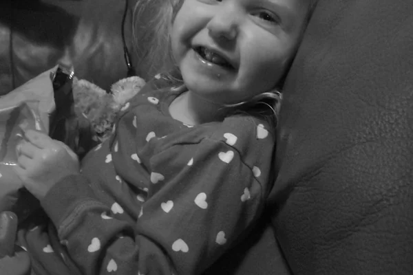 black & white portrait - Evie giggling