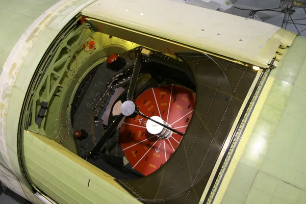 The German-built 100-inch telescope that is the heart of NASA's Stratospheric Observatory for Infrared Astronomy is nestled in the SOFIA 747's rear fuselage