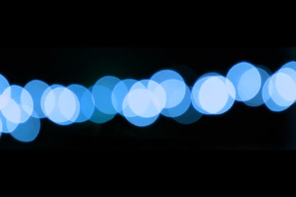 Blue Bokeh on Black Background