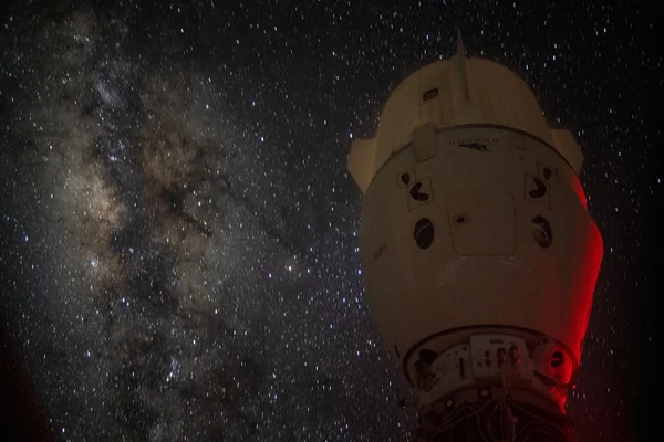 The Milky Way appears behind the SpaceX Dragon Endeavour