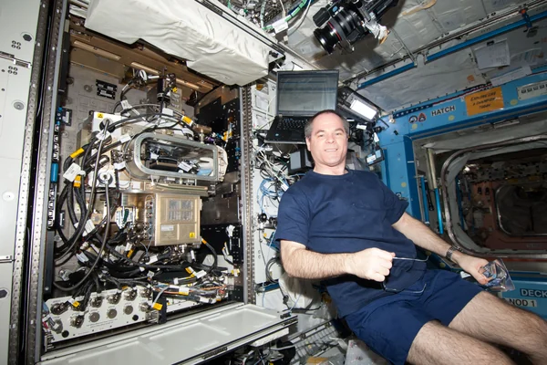 Ford poses at the FIR/LMM/ACE in the U.S. Laboratory