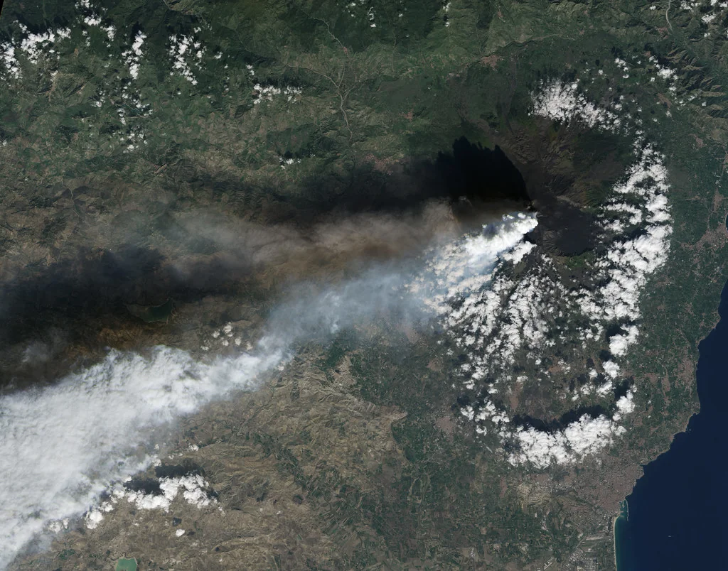 Volcanic Plumes Tower over Mount Etna